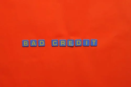 Bad Credit Text on Red Surface